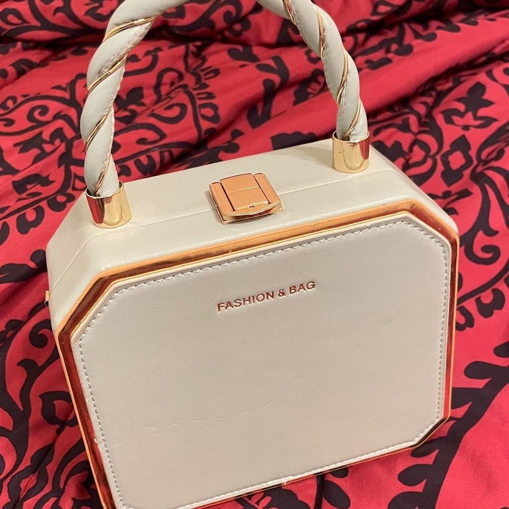 Pale green/blue ish square hand bag